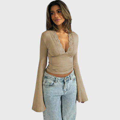 Long sleeve top with lace details and flared sleeves