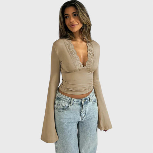Long sleeve top with lace details and flared sleeves