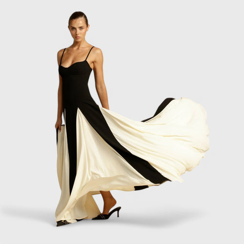 Long dress with narrow straps and a wide skirt