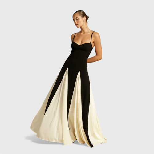 Long dress with narrow straps and a wide skirt