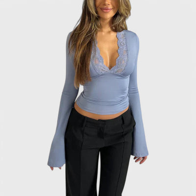 Long sleeve top with lace details and flared sleeves