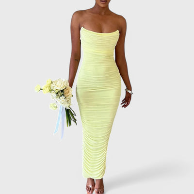 Long dress with narrow straps and side pleats