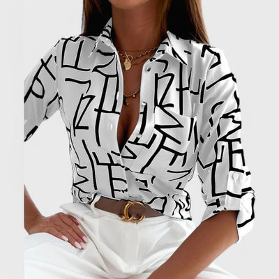 Blouse with shirt collar, button closure and pattern