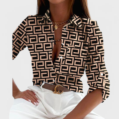 Blouse with shirt collar, button closure and pattern