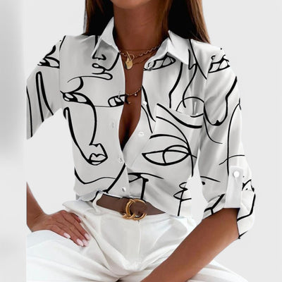 Blouse with shirt collar, button closure and pattern